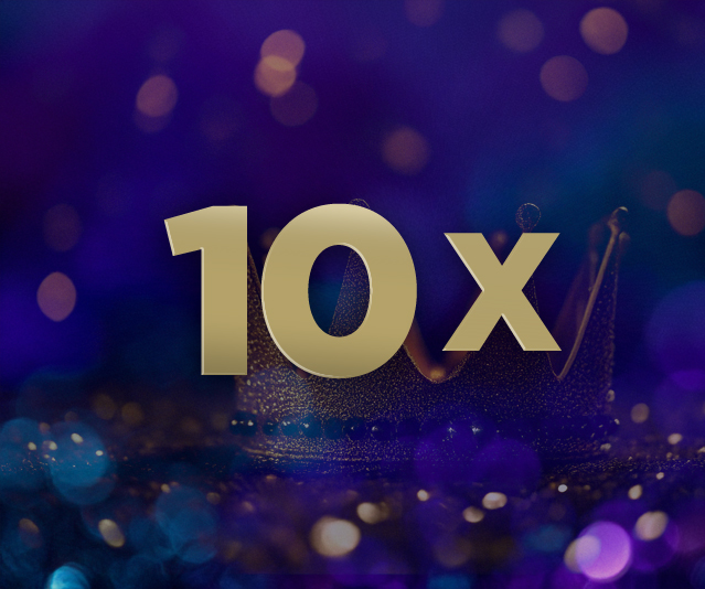 '10X' in the middle of a black background with blurred multicoloured lights 