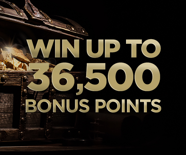 "Win up to 36,500 bonus points" in the middle of dark background and a close up treasure chest filled with gold