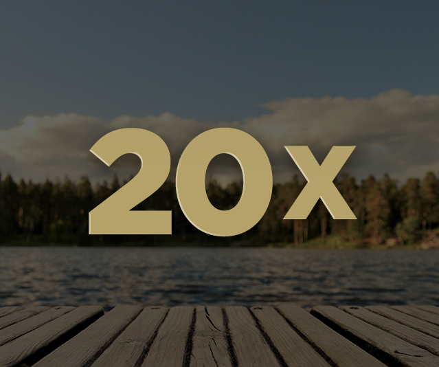 20x in the middle with blurred background of a dock and lake