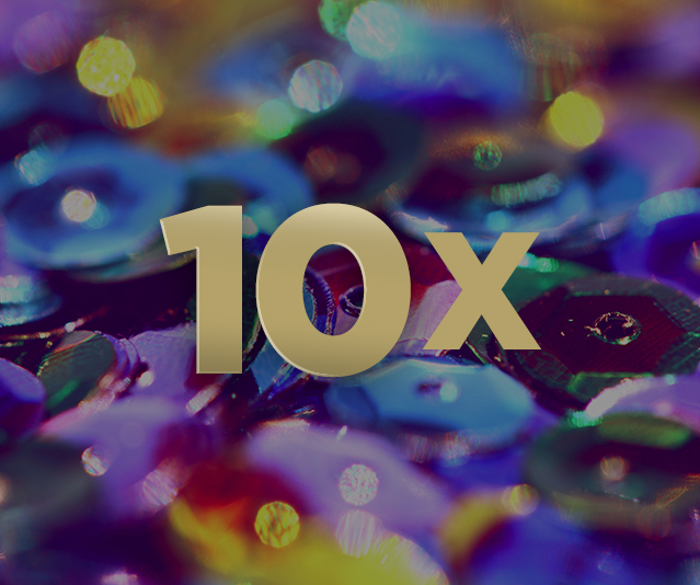 '10X' in the middle of a blue sparkly background