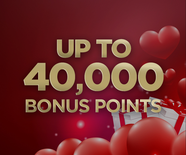 ‘UP TO 40,000 BONUS POINTS’ in the middle of a red background with red hearts and presents