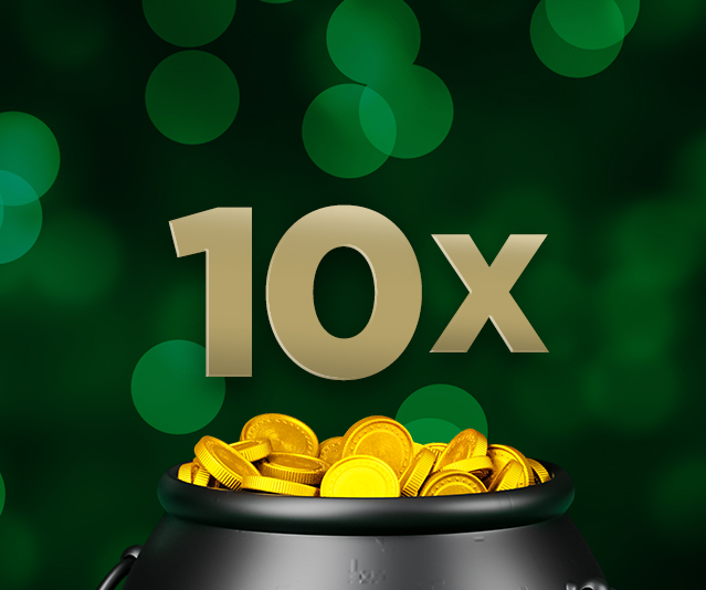 ‘10x’ on a dark green background with blurred green light, with a black pot filled with shiny gold coins.