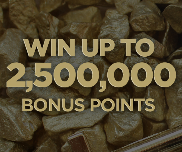 ‘WIN UP TO 2,500,000 BONUS POINTS’ in the middle of a background of gold coloured rocks